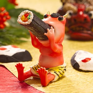 節分で恵方巻を丸飲みする鬼カエル